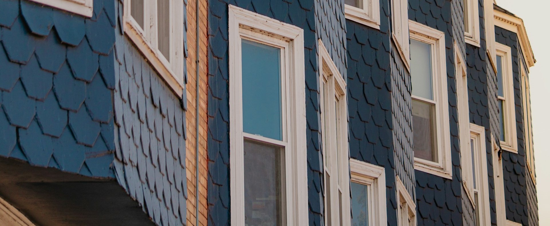 Picture of a blue apartment building in Buffalo